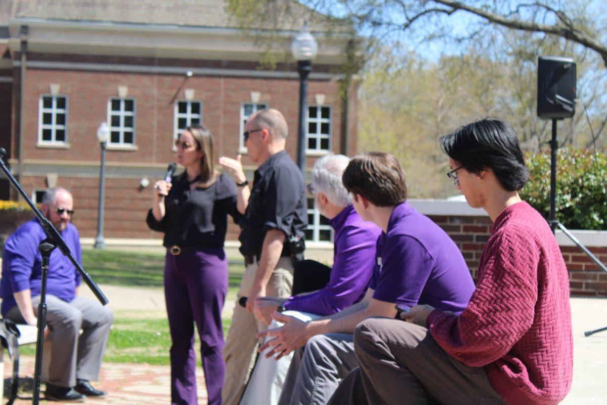 (Right to left) SGA representatives Phoenix Vu and Brad Lewis, and UCA President Houston Davis listen to Chief of Staff Amy Whitehead answer a question. The town hall aimed to inform students about current campus matters.