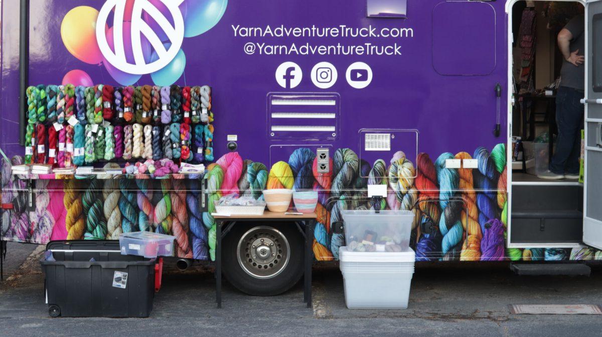The Yarn Adventure Truck sets up supplies for the UCA alumni event. The event aimed to allow attendees to network and de-stress.