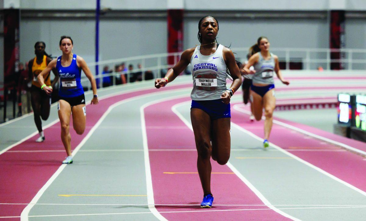 Freshman Troynelle Miller rushes past her competition in the Randal Tyson Track Center. Miller’s indoor personal bests include a time of 7.56 in the 60-meter dash and a time of 25.13 in the 200-meter dash.