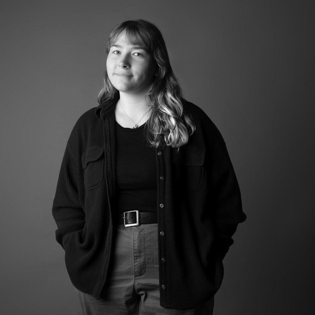 Madison Ogle poses with her hands in her pockets. Stepping outside of her comfort zone and joining The Echo made time fly by during college. 