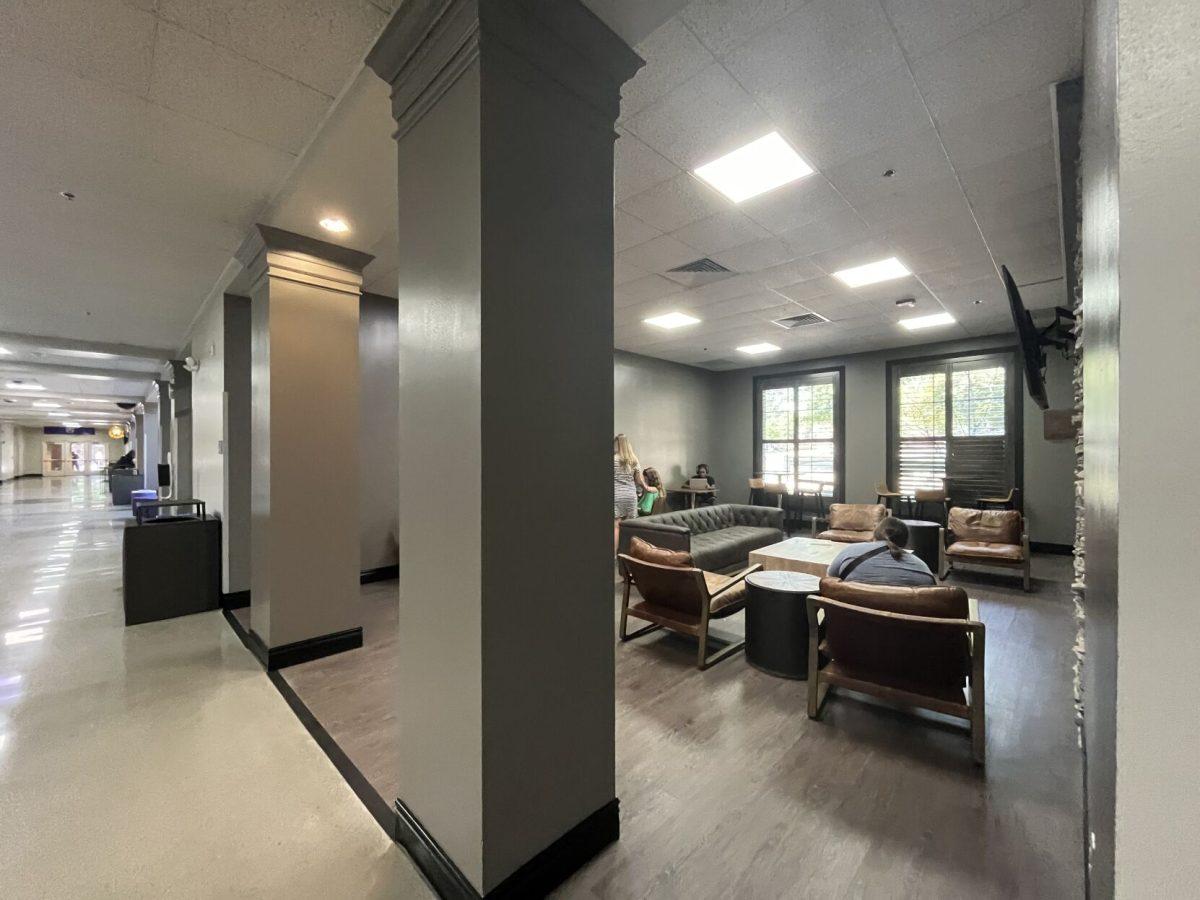 Students sit in the Ronnie Williams Center's new lounge. The Student Center also received new flooring, painting and furniture in the main lobby.