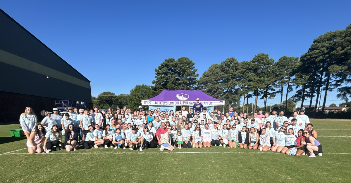 Participants gather together after completing the 5K. The Be the Light 5K raised money for suicide awareness in honor of Cameron Maynard.