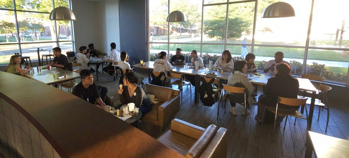 Students at the Christian Cafeteria participate in Conversation Partners, an event connecting international students to American students. The event took place Sept. 25. 