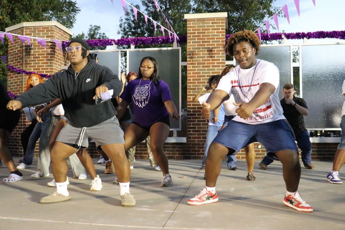 Students dance on stage during the Block is Hot, hosted by the Students for the Propagation of Black Culture. The Oct. 23 event took place at the Ronnie Williams Student Center Amphitheater.