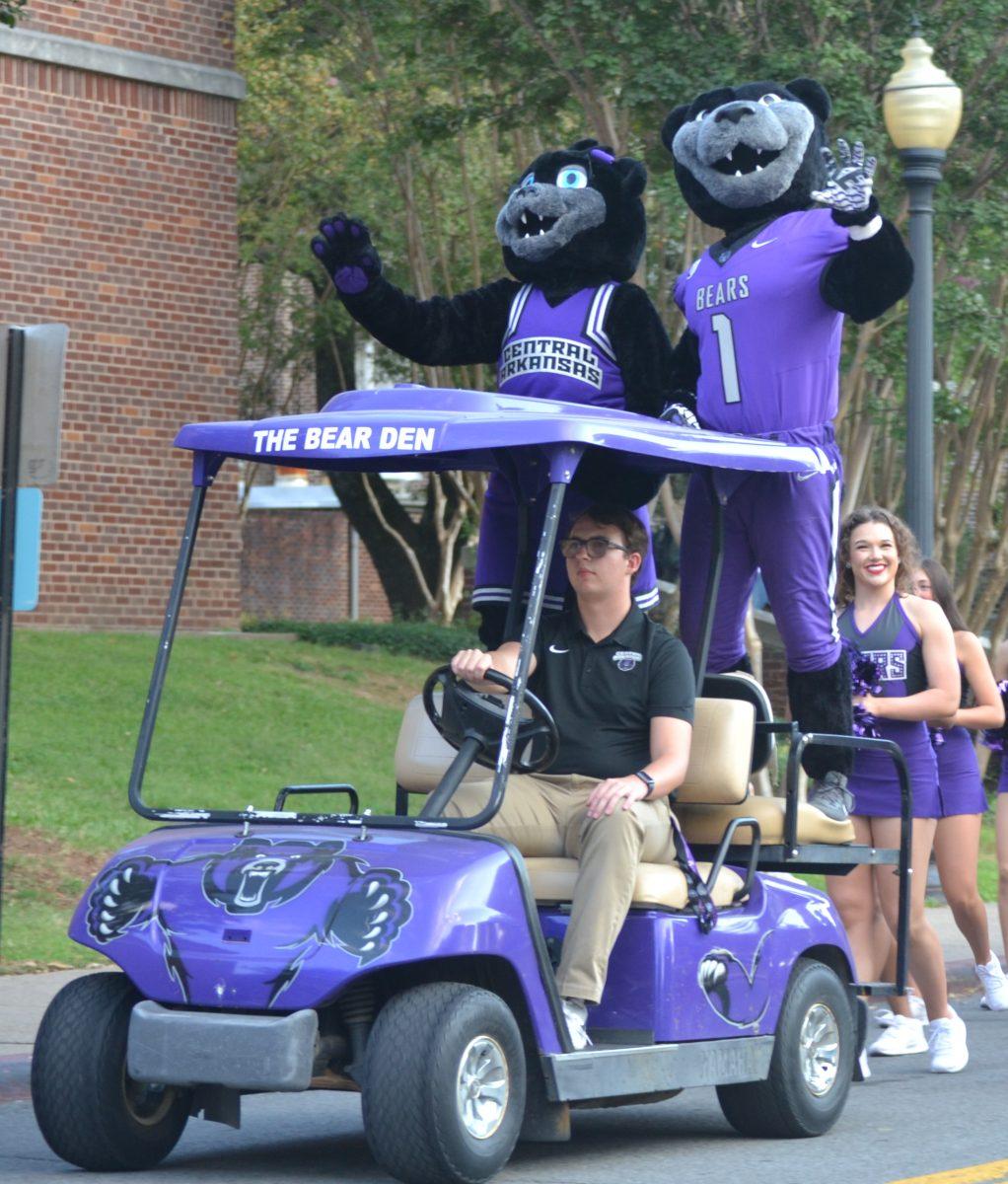 Mascots Bruce and Sugar Bear wave to the crowd. The parade also feature UCA President Houston Davis, several Greek organizations and cheerleaders.