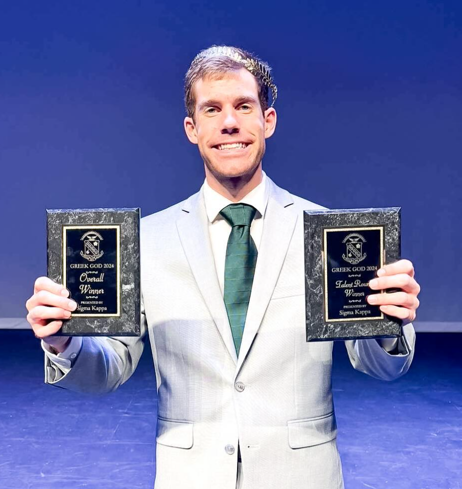 Sigma Tau Gamma member Ryan Huselton stands on the Reynolds Performance Hall Stage. He won the Greek God pageant Sept. 26.