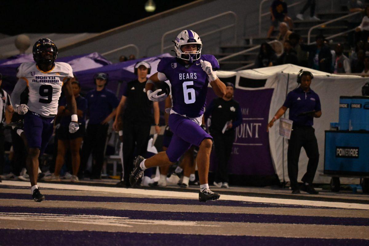 (left)
Senior defensive back Gregory Reddick chases down (right) redshirt freshman receiver Malachi Henry.