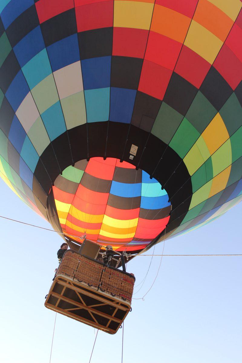 The hot air balloon flies over the intramural field on Nov. 1.