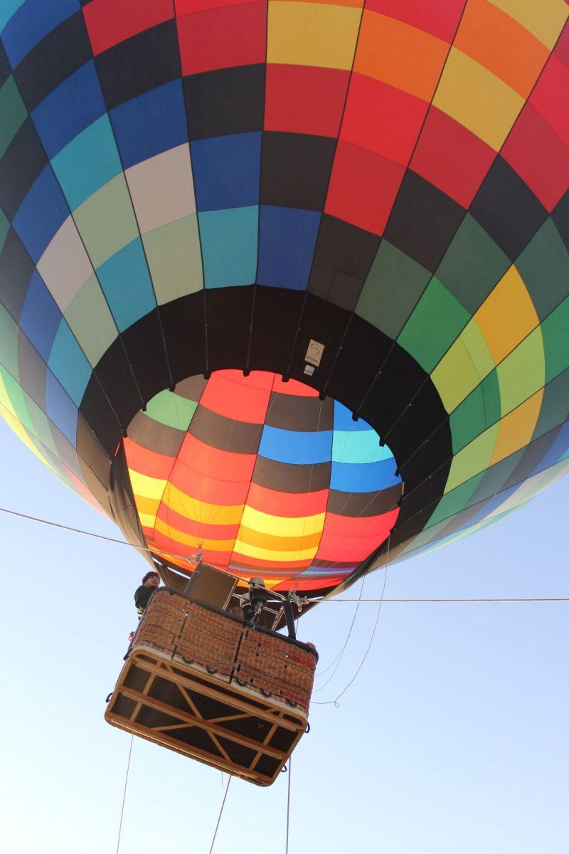 The hot air balloon flies over the intramural field on Nov. 1.