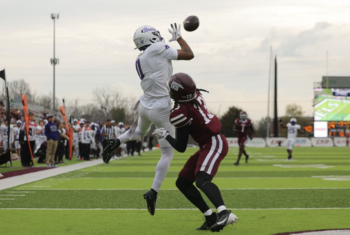 (Left) UCA senior wide receiver Trejan Bridges leaps in the air to make the catch while being contested by(right) Eastern Kentucky defensive back Jordon Thomas. In the win against Eastern Kentucky, Bridges hadeight receptions going for 143 yards.