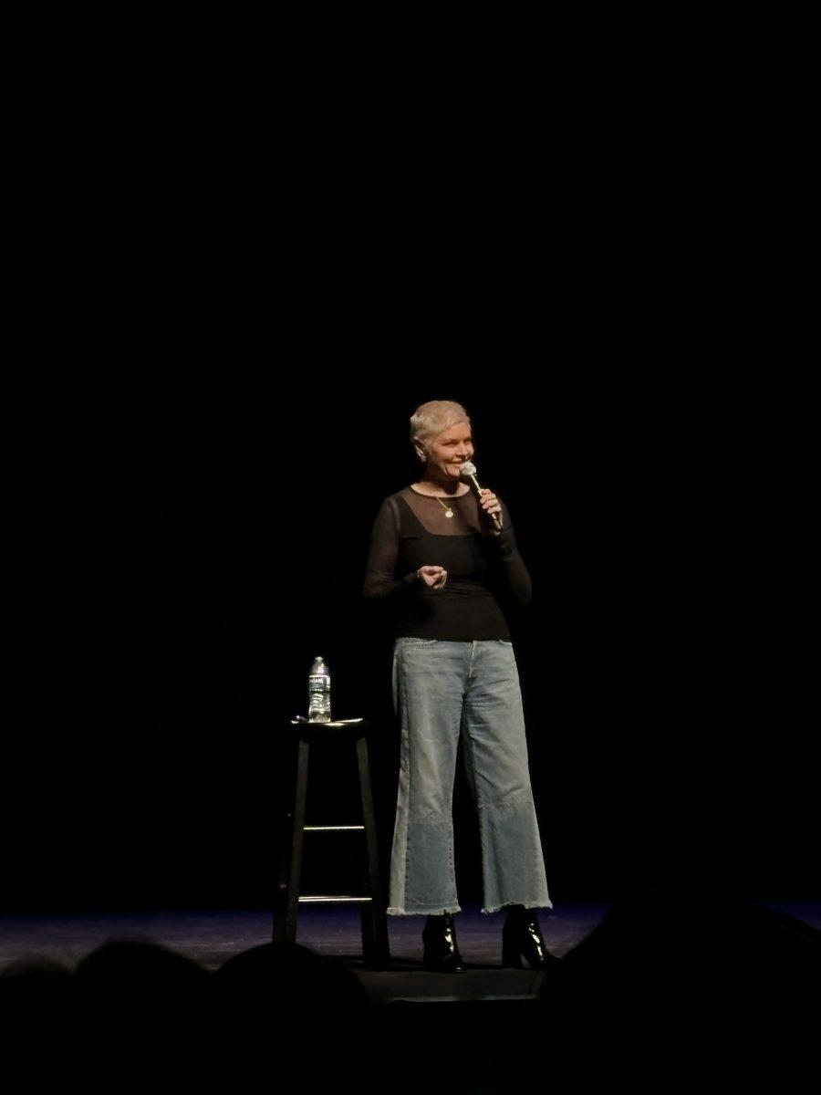 Heater Land on stage. Auditorium filled with laughter during performance