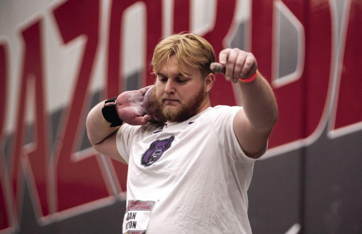 Junior Aidan Patton competes in the shotput event at the Arkansas Invitational. Patton holds the UCA program record in both the indoor and outdoor shotput events. 