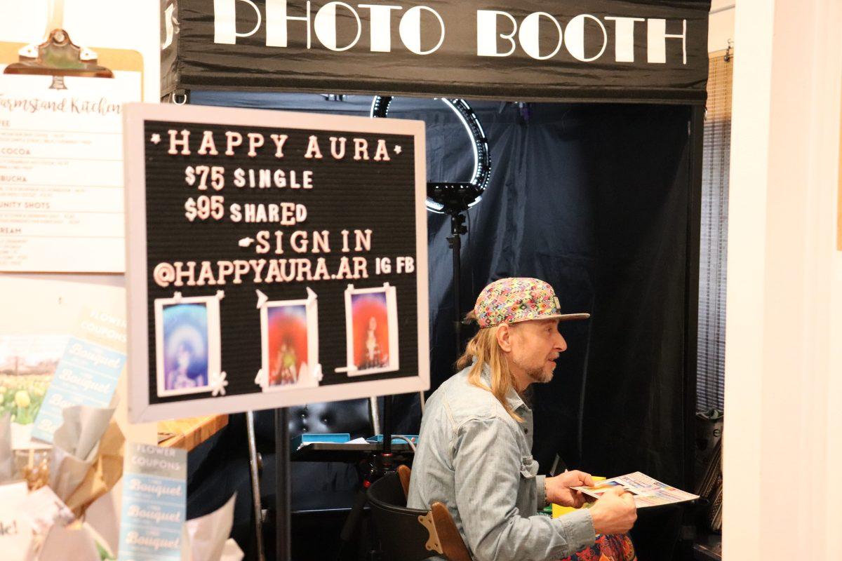 Krystian Samek, half owner of Happy Aura, performed color readings. 