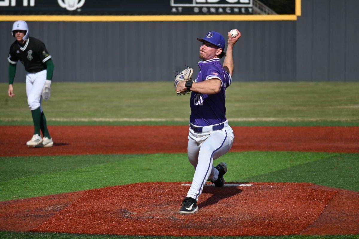 Senior right-handed pitcher Perry Titlow pitches in the fifth inning for the Bears. Titlow has thrown four strikeouts in three games this season.
(photo by Meredith Lipsey)