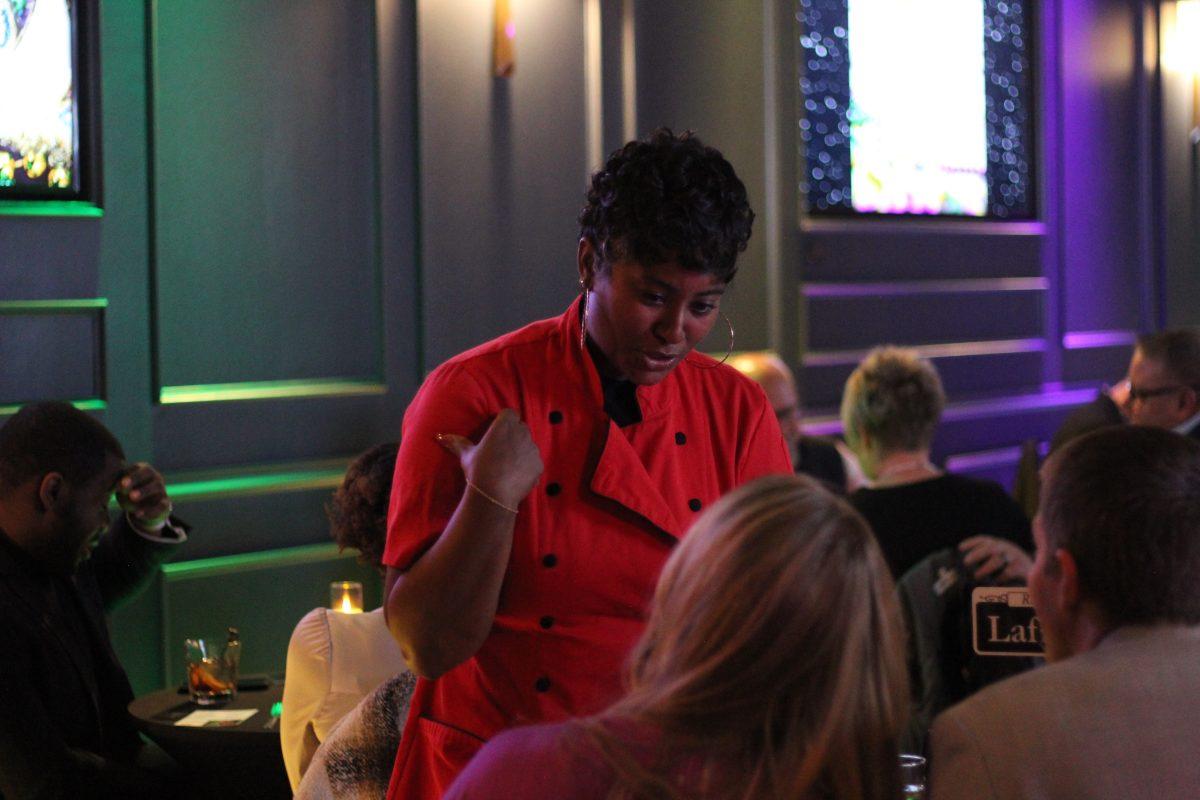 Chef MaryAnn talks to guests. A four-course menu was presented throughout the night. 