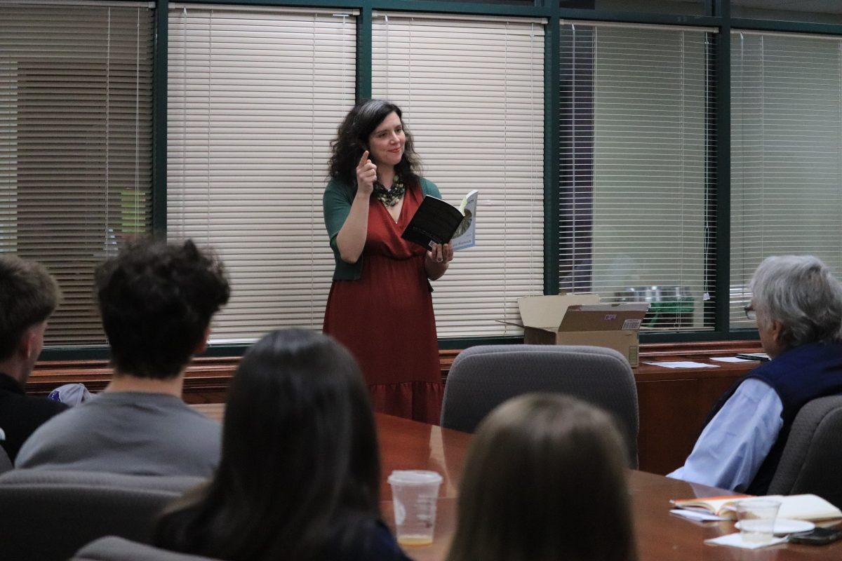 Poet Katie Hartsock recites poetry in Win Thompson Hall. Hartsock alsodiscussed her book “Wolf Trees.”