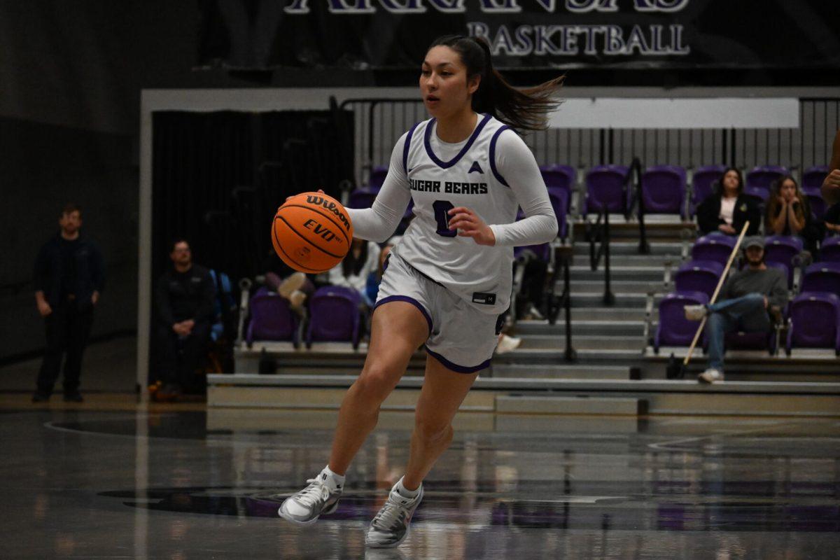 Senior guard Jade Upshaw dribbles the ball down the court in UCA's ASUN quarter-final game against Bellarmine. She has scored 844 points for the Sugar Bears throughout her two-year career at UCA.