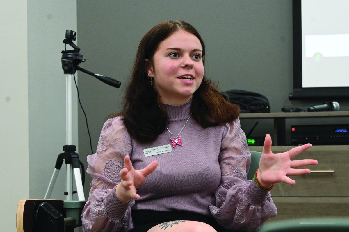 Senior Torrie Herrington answers questions from the audience after her presentation on the Holocaust. The three seniors that presented at this event were Brenna Metts, Cooper Horton and Torrie Herrington.