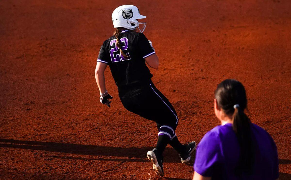 Junior infielder/outfielder Lilly Hood steals first base against Mississippi State April 1. Hood has had 39 hits, batted 26 runs in and scored 21 runs for the Bears this season. 