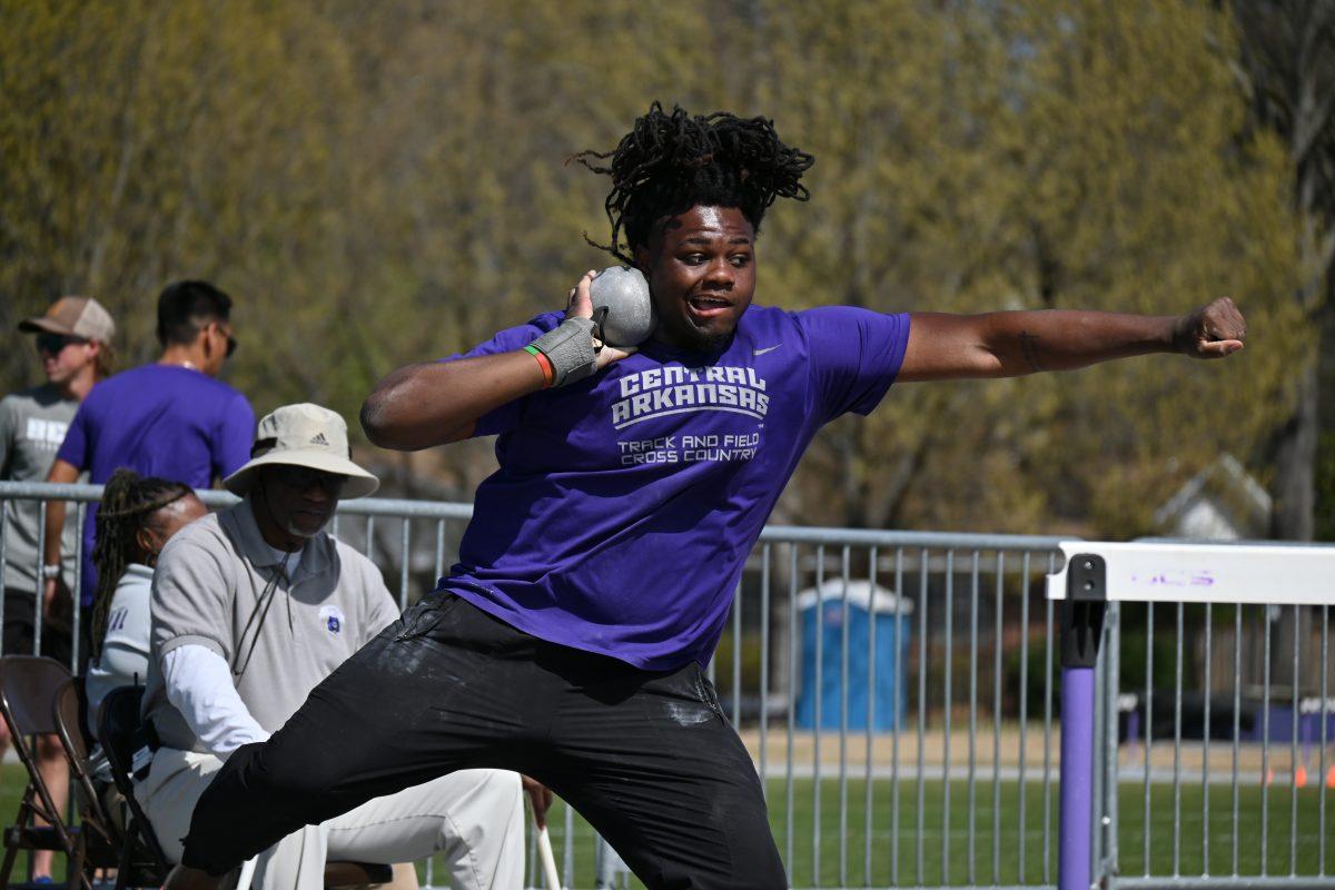Graduate thrower Malik Beasley competes in the shot put at the Richard Martin Invitational. Beasley owns a personal best of 16.39m in the outdoor event. 