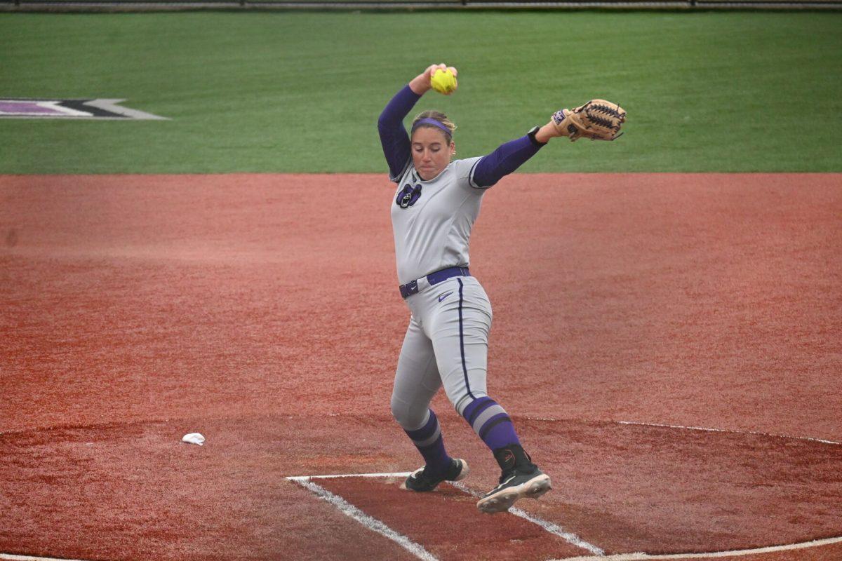 Senior pitcher Bailie Runner throws a drop ball pitch at the top of the first inning against EKU. Runner had a season high of seven strikeouts on Sunday.
