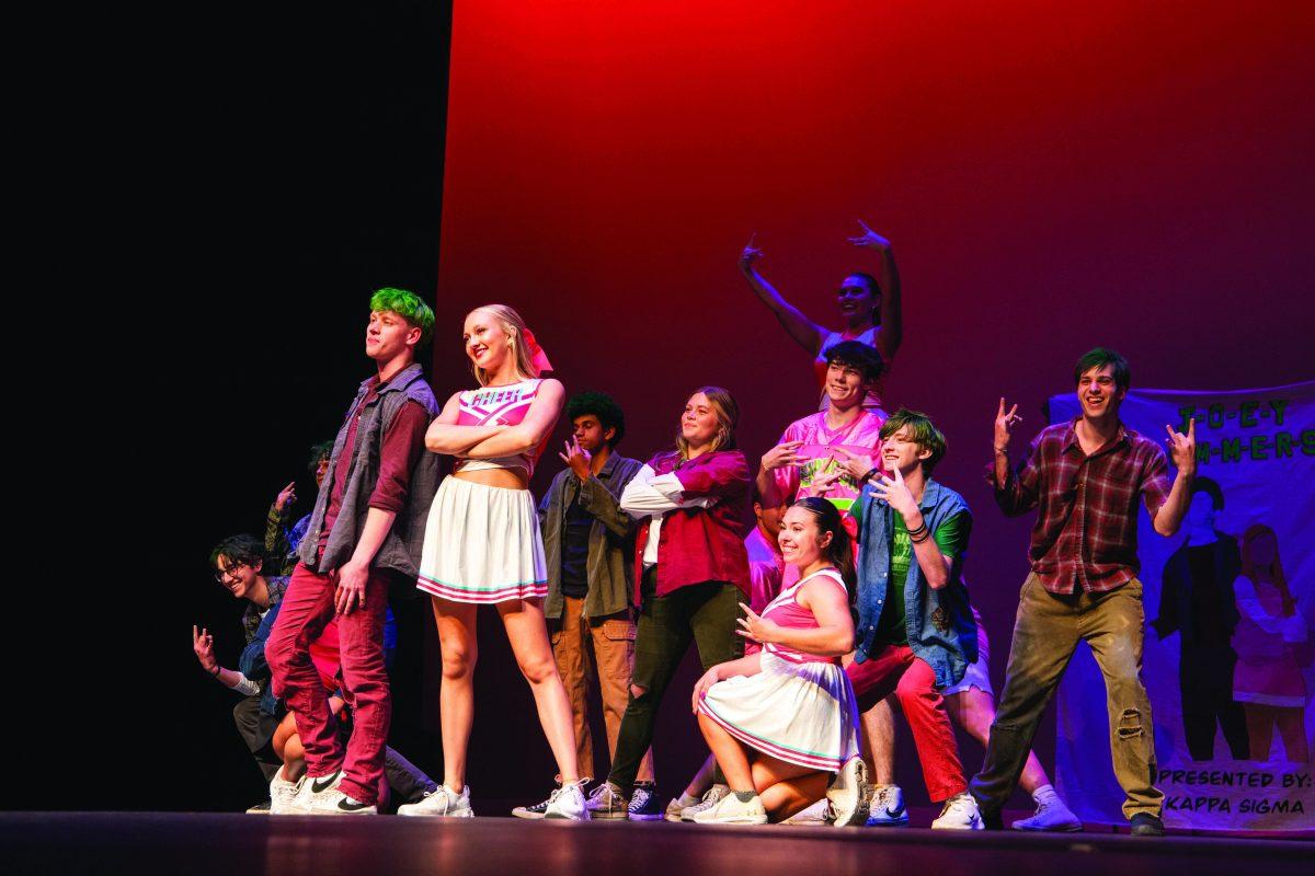 Greek Life participants pose during zombie performance. Multiple themes were used during performances.
