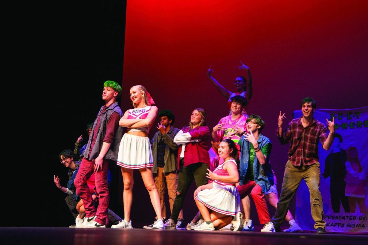 Greek Life participants pose during zombie performance. Multiple themes were used during performances.