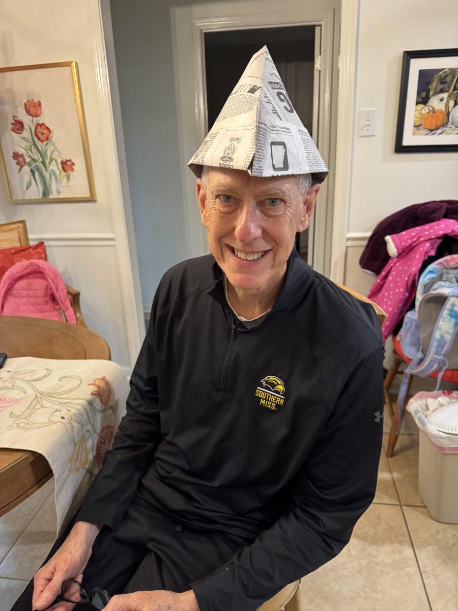 David Keith with a newspaper hat.