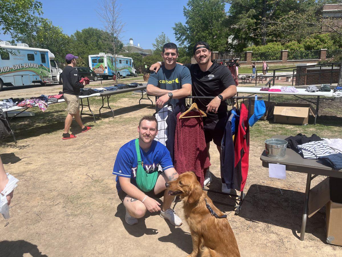 (Left to right) Staff members Mitchell Wollard, Colt Williams and director Justin Linck working at the ChiAlpha thrift store. The purpose of this event was to give back to the UCA community.