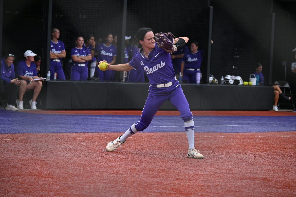 Senior third baseman Kylie Griffin throws the ball to freshman first baseman Kaitlyn Graham to beat a Lipscomb player to first base. Griffin has had 40 putouts and 80 assists this season for the Bears.