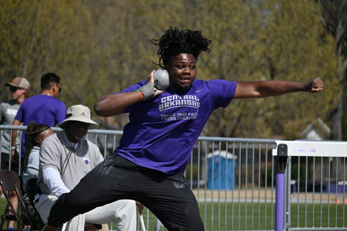 Graduate thrower Malik Beasley competes in the shot put at the Richard Martin Invitational. Beasley owns a personal best of 16.39m in the outdoor event. 