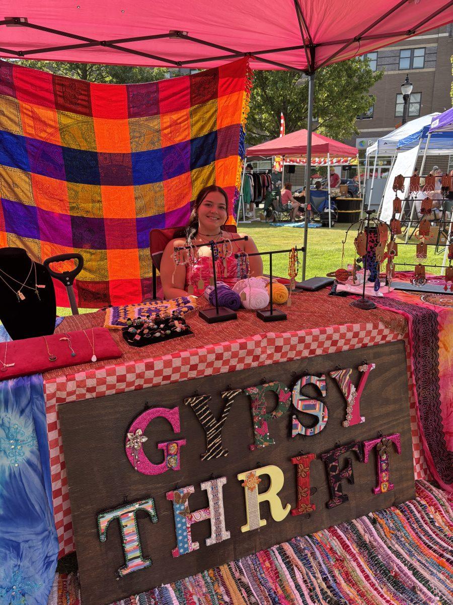 One of the many vendors of the day, Kayleigh Ginn, can be seen with her hand-crafted and funky jewelry. (photo by Harper Phillips)