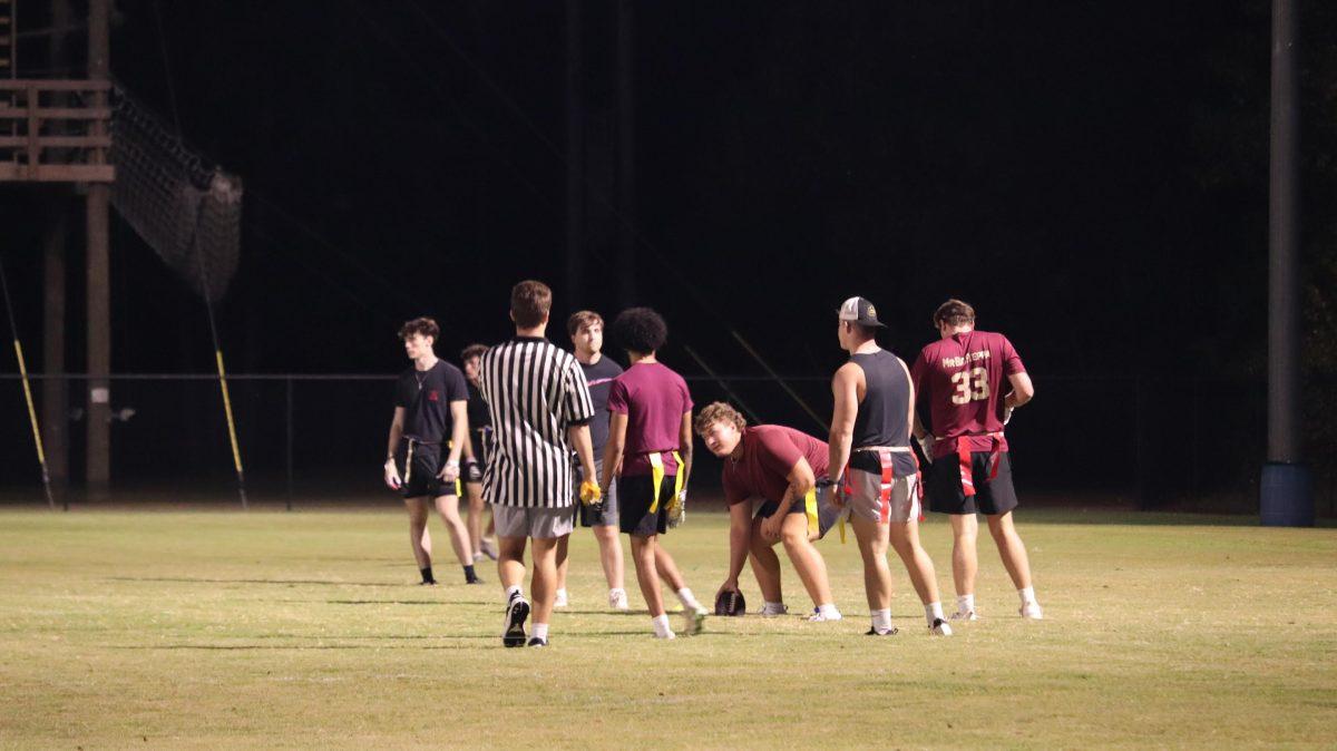 Pi Kappa Alpha and Sigma Tau fraternity members set up the ball during the final match of the tournament. Pi Kappa Alpha won 14-0. 
