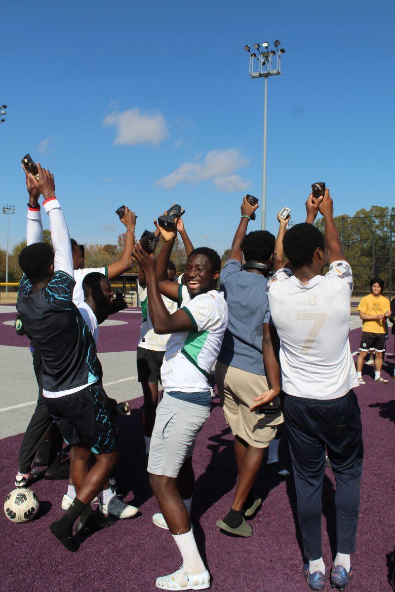 Students from the Ivorian Association celebrate their win after the final match. The tournament was hosted by the Ivorian Association, Team Global and the African Students Association along with the Center for Global Learning and Engagement.
