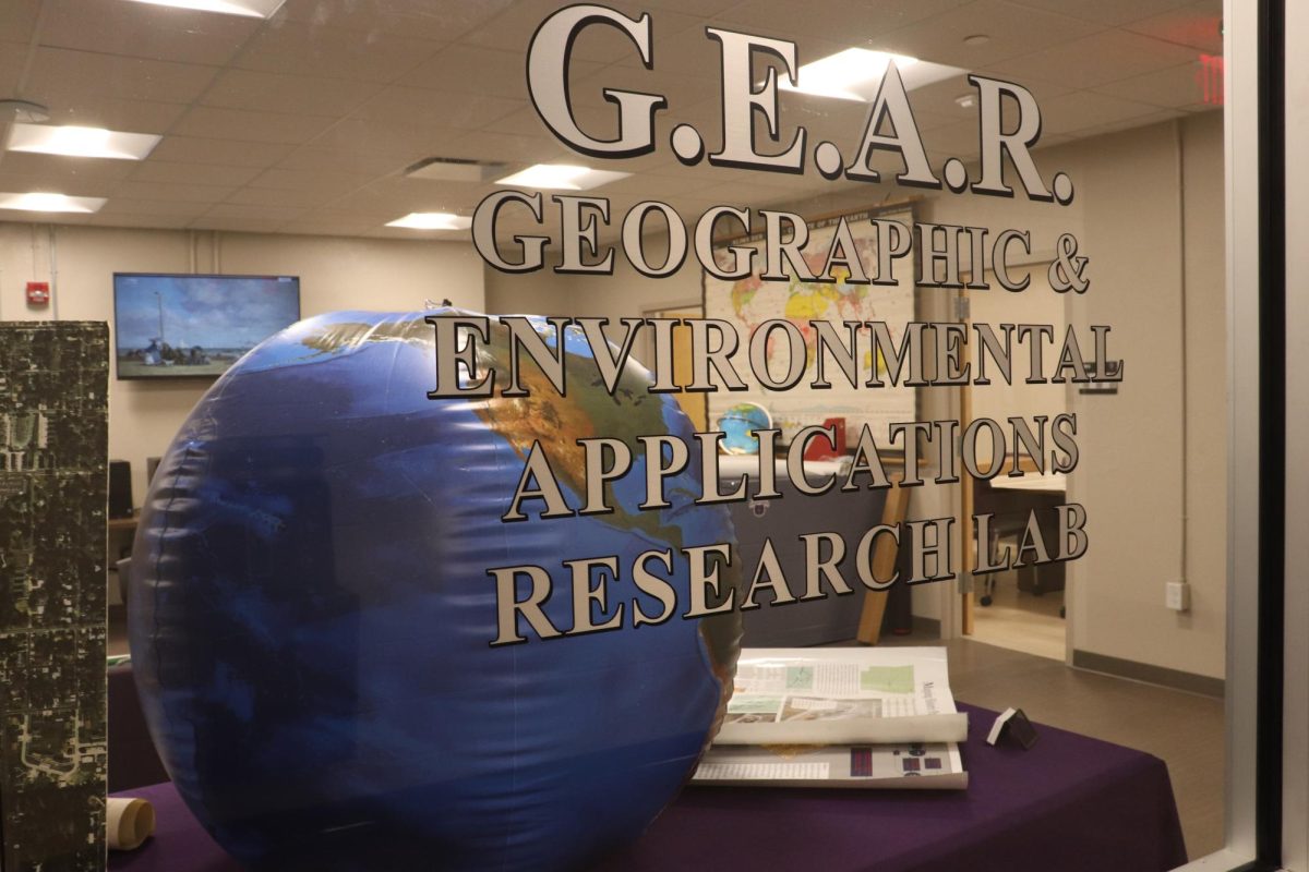 Geography club members redecorate the newly reopened Burdick Hall Feb. 5 during x-period. With the buildings reopening, geography students now have access to the G.E.A.R. Lab.