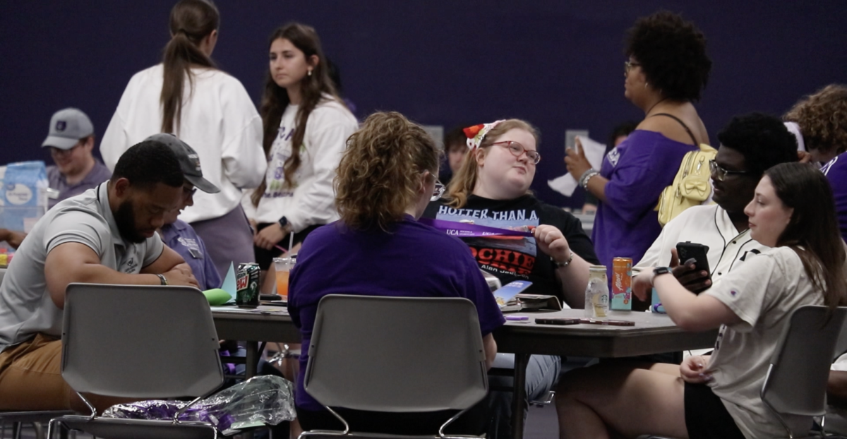 Students socialize at Housing and Residence Life's "The Finals Countdown" April 15. Students could choose from several games, interactive tables, temporary tattoos, mocktails and crafts. 
